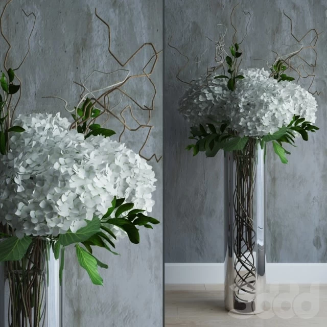 White hydrandeas in tall vase with branches