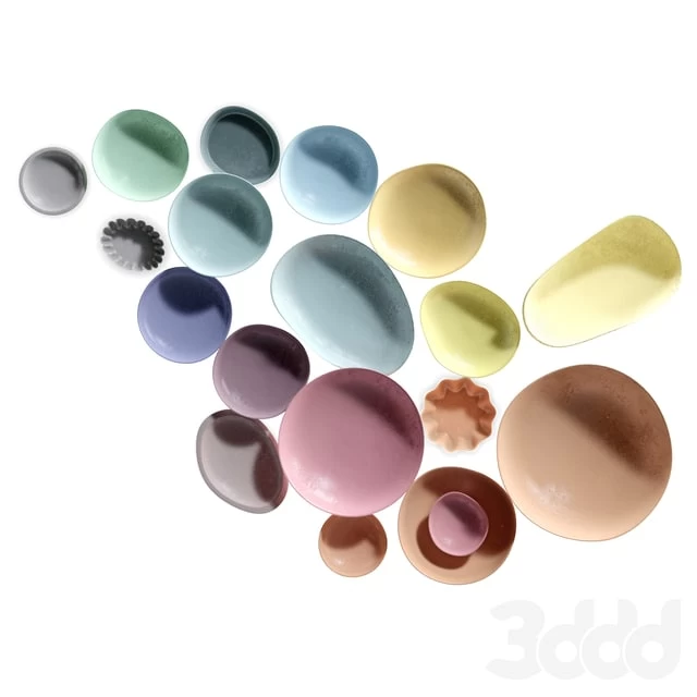 COLLECTION OF CLAY PLATES ON THE WALL